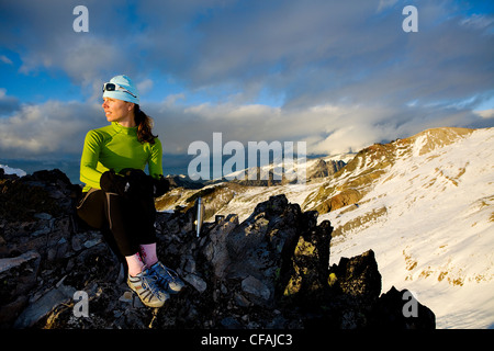 Woman runner resting on Brohm Ridge near Squamish, British Columbia, Canada. Stock Photo