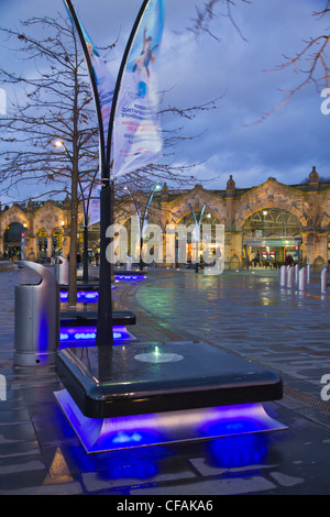 Sheffield train station at night with illuminated fountains and water feature South Yorkshire England Stock Photo