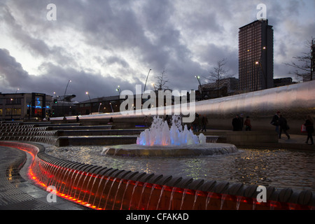 Sheffield train station at night with illuminated fountains and water feature South Yorkshire England Stock Photo