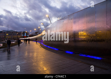 Sheffield train station at night with illuminated fountains and water feature South Yorkshire England Stock Photo