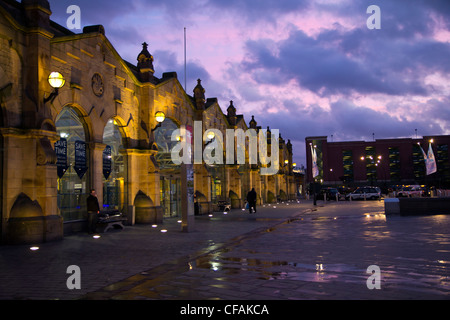 Sheffield train station at night with illuminated fountains and water feature South Yorkshire England Stock Photo