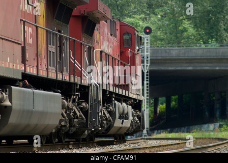 Two CP locomotives lead a train through Burnaby, BC, Canada. Stock Photo