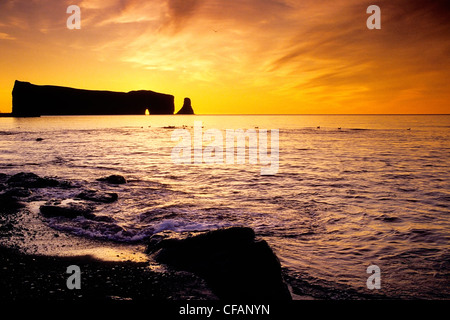 Perce Rock at sunrise, Perce, Gaspe, Quebec, Canada Stock Photo