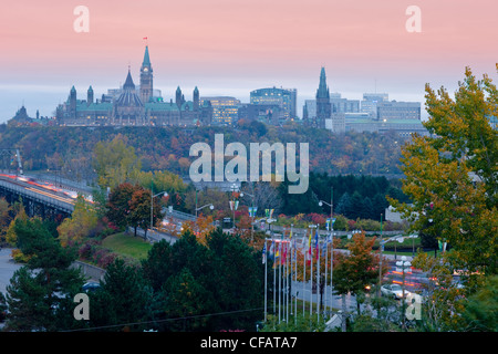 View of Ottawa, Ontario at dusk from Hull, Quebec, Canada. Stock Photo