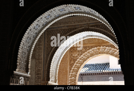 Spain - Andalucia - Granada - the Alhambra Palace - Moorish arches - intricately carved archways. Stock Photo