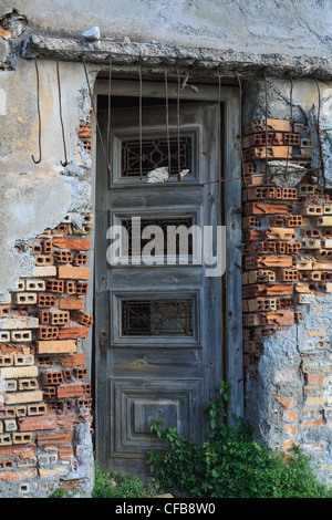 Old and abandoned brick house with broken windows Stock Photo - Alamy