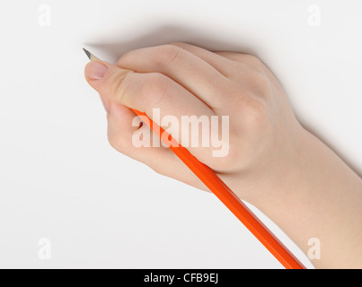 Hand with pencil. Over grey empty a paper. Imitation to write Stock Photo