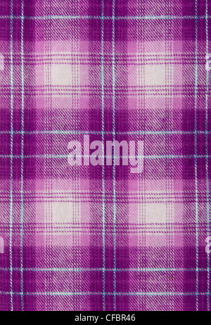 Purple cloth, checkered background. Stock Photo