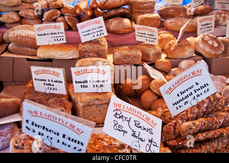 Speciality breads and rolls on a bakery stall in the Market Square, Cambridge, England, UK Stock Photo