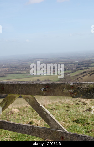An old wooden gate at Ditchling Beacon on the South Downs, West Sussex, England.
