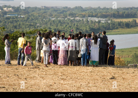 Wedding party celebrates on Bezawit Hill overlooking the source of the Blue Nile leaving Lake Tana near Bahir Dar in Ethiopia Stock Photo