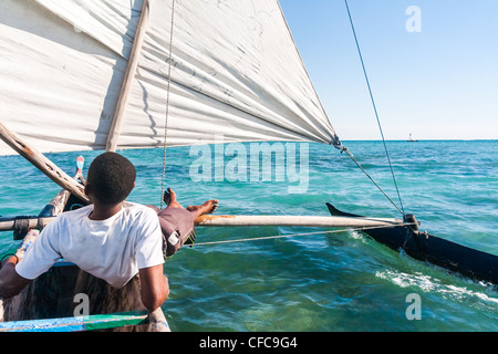 Vezo dugout skipper off to Anakao, southern Madagascar Stock Photo