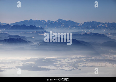 Aerial photo of northern Chiemsee in winter, view south towards the Chiemgau and Austrian Alps, Bavaria, Germany Stock Photo