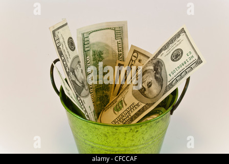 bucket with dollars Stock Photo