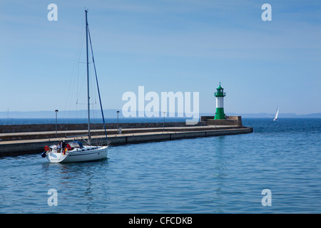 Lighthouse and sailing boats in the harbour, Sassnitz, Ruegen island, Baltic Sea, Mecklenburg-West Pomerania, Germany