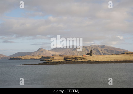A view from Canna looking across Sanday with Rhum in the background Stock Photo