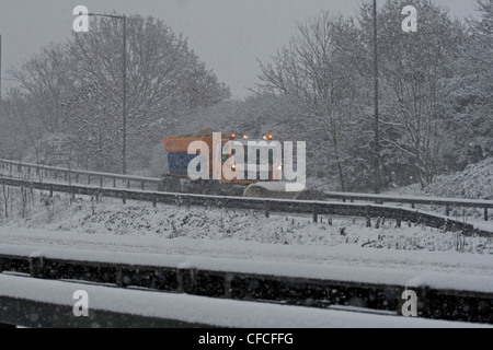 A snow plough on the M4 Berkshire UK Stock Photo