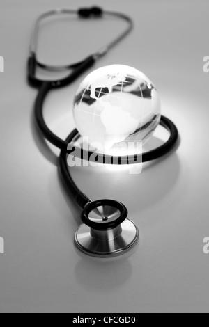 Stethoscope and Globe, concept of World Problems Stock Photo