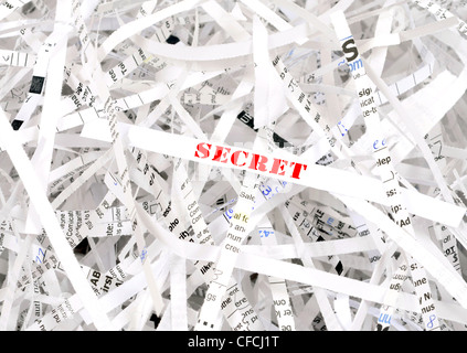 Secret text surrounded by shredded paper. Great concept for information protection Stock Photo