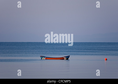 colourful canoe rest lies moored float near Stock Photo