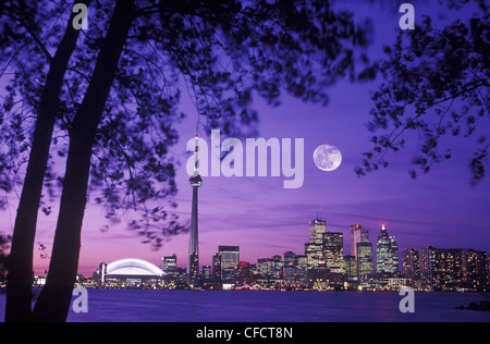 Skyline with CN tower at dusk with moon, Toronto, Ontario, Canada. Stock Photo