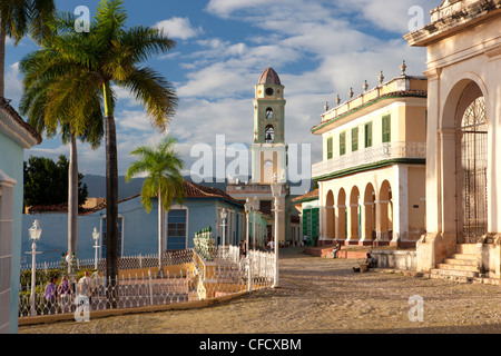 View across Plaza Mayor towards the tower of Iglesia y Convento de San Francisco, Trinidad, Cuba, West Indies Stock Photo
