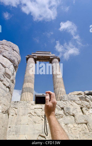 Photographing Didyma, an ancient Ionian sanctuary, in modern Didim, Turkey, containing the Temple of Apollo, the Didymaion. Stock Photo
