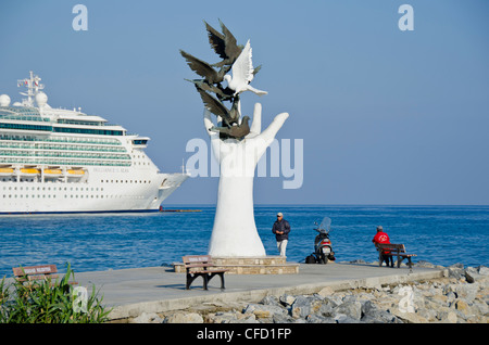 Hand of Peace Monument, cruise ship, Kuşadası, a resort town on Turkey's Aegean coast in Aydın Province Stock Photo