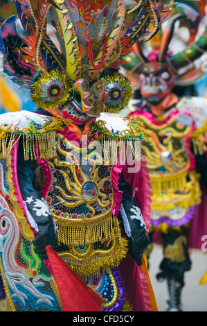 Masked performers in a parade at Oruro Carnival, Oruro, Bolivia, South America Stock Photo