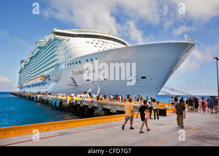 Royal Caribean's Allure of the Seas docked at the port of Cozumel, Mexico. Stock Photo