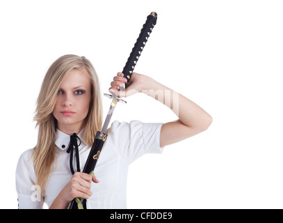 Beautiful blond hair businesswoman with katana sword Stock Photo