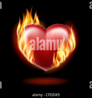 Heart on fire on a black background . Stock Photo