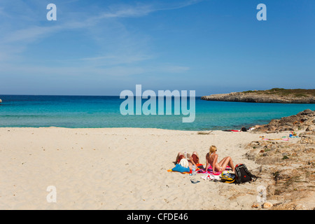 People on the beach in the sunlight, Cala Varques, Mallorca, Balearic Islands, Spain, Europe Stock Photo