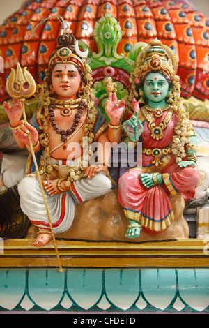 Close-up of Shiva and Parvati statues in Hindu temple, France, Europe Stock Photo