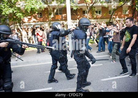 Protest of the indignants (spanish revolution) and clashes with police in Barcelona near the Catalan Parliament, Parc Ciutadella Stock Photo