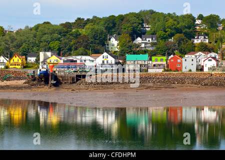 Main street reflected in harbour, Digby, Bay of Fundy, Nova Scotia, Canada Stock Photo