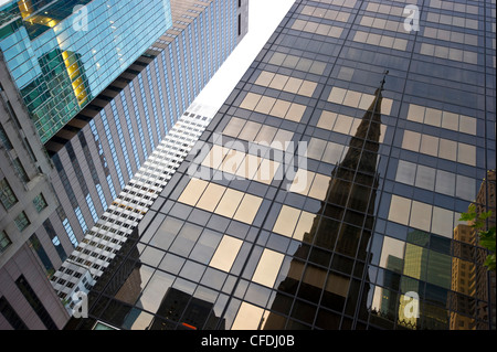 Reflection of St. Patrick's Cathedral on a high rise building, Manhattan, New York, USA, America Stock Photo