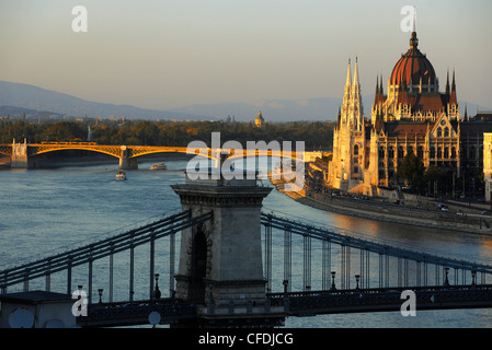 View of Danube river, Chain Bridge and House of Parliament in the evening, Budapest, Hungary, Europe Stock Photo