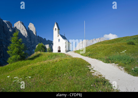 Chapel in the sunlight in front of Dolomites, Groedner Joch, Sella, South Tyrol, Alto Adige, Italy, Europe Stock Photo