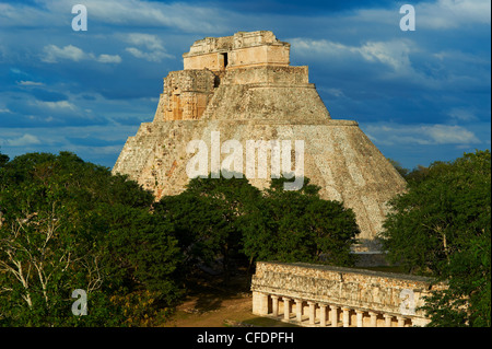 Pyramid of the Magician and The Ball Game Field, Mayan archaeological site, Uxmal, Yucatan State, Mexico Stock Photo