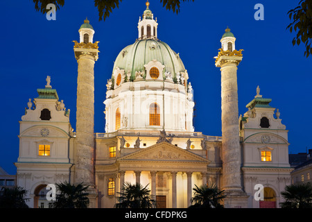 Illuminated St. Charles's church at night, Karlsplatz square, Vienna, Austria, Europe Stock Photo