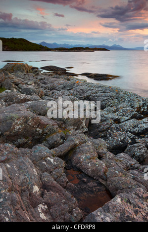 A summer evening view towards the Isle of Skye from Drumbuie, Scotland, United Kingdom, Europe Stock Photo