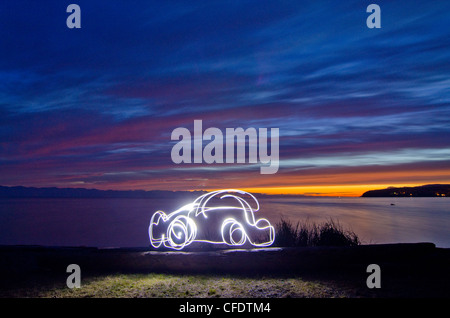 flashlight used light paint car during sunset Stock Photo