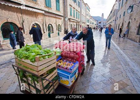 Fruit and vegetables going to market in the streets of the Old Town, Stradun (Placa), Dubrovnik, Croatia, Europe Stock Photo