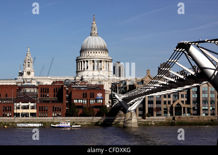 A view across the River Thames from the South Bank, to the dome of St Paul's Cathedral and the Millennium Bridge. Stock Photo