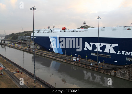 Car Transport Ship Traveling Through The Miraflores Locks On The Panama Canal Stock Photo