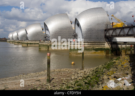 View of the Thames Barrier from the river bank, London. Stock Photo
