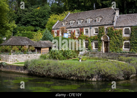 Swan Hotel and River Coln, Bibury Village, Gloucestershire, Cotswolds, England, United Kingdom, Europe Stock Photo