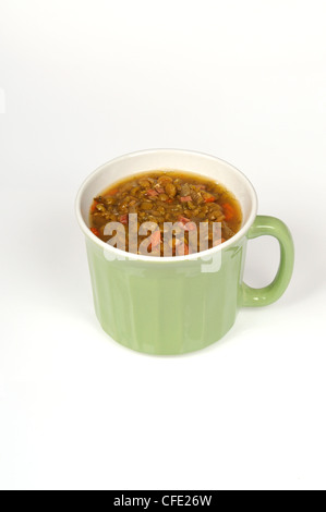 Mug of homemade split pea and ham soup Stock Photo