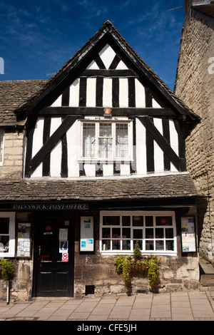 UK, Gloucestershire, Stroud, Painswick New Street, half timbered Post Office with old Norwich Union Insurance sign Stock Photo